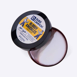 Duke Cannon Bloody Knuckles Hand Balm open container showing white balm, fragrance free, 5oz