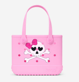 Pink Bogg Bag Bitty tote with skull and crossbones bow graphic