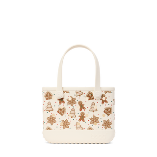 Bogg Bag Bitty tote in coconut with festive gingerbread cookie print pattern on white background