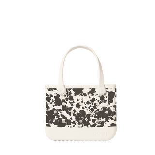 Bogg Bag Bitty small tote in white with black cow print pattern