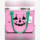 Pink Bogg Bag Bitty tote with jack-o-lantern face and teal handles
