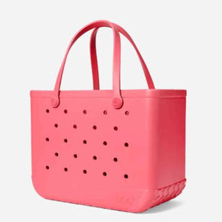 Coral pink Original Bogg Bag side profile with ribbed tip-proof base