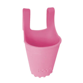 Vibrant pink Bogg Bevy cup holder highlighting bold hue and clean silhouette
