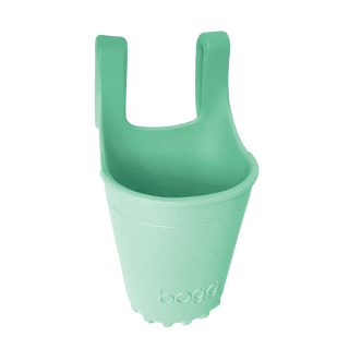Mint green Bogg Bevy cup holder with smooth contours and uniform color saturation