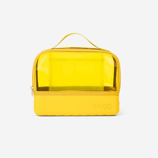 Bright yellow Bogg wet bag with solid silicone base, translucent compartment, and embossed logo