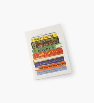 Rifle Paper Co. Book Stack Birthday Card featuring stacked colorful illustrated books with birthday greeting