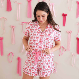 Pink drawstring waist detail on ruffled shorts of women's pajama set