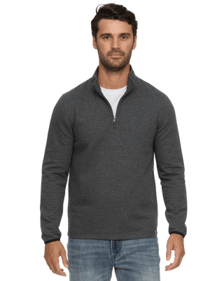 Man wearing Flag Bradner charcoal heather quilted quarter-zip mock neck pullover with jeans