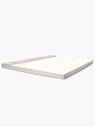 Studio Oh Bubble Gum Milkshake undated weekly desk pad with pink striped cover and gold brad binding