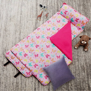 Pink butterfly nap mat laid flat on carpet styled with teddy bear and toys