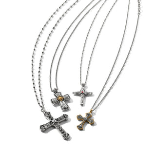 Assorted women's cross necklaces in silver and gold tones with gemstones and varied chains