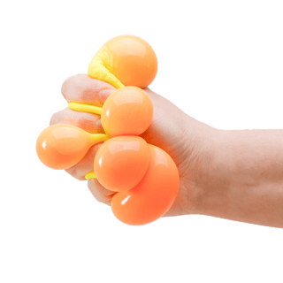 Hand squeezing an orange and yellow color-change Needoh stress ball toy