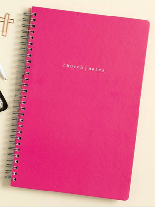 Hot pink spiral-bound church notes notebook by Girl Open Your Bible on neutral background