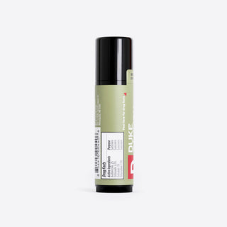 Duke Cannon Cannon Balm SPF15 lip balm showing back label with drug facts and ingredients