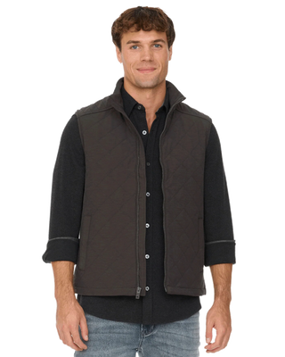 Flag & Anthem Chapin dark olive quilted zip-up vest worn over black shirt