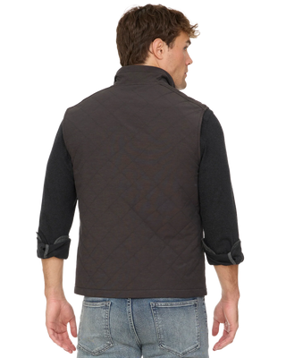 Flag & Anthem Chapin dark brown quilted vest, back view, worn over black shirt