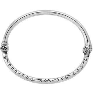 Brighton silver bangle bracelet with decorative scrollwork pattern and ornamental end caps