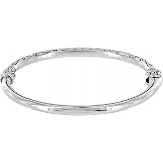 Brighton silver bangle bracelet with decorative beaded pattern and ornate end caps