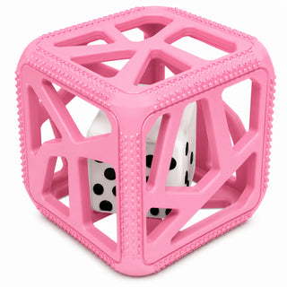 Close-up pink Malarkey Kids sensory teething cube showing geometric frame and raised dot details