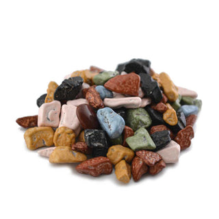 Pile of colorful rock-shaped chocolates in brown, black, blue, green, and pink