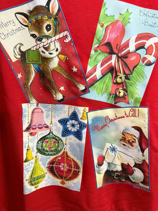 Red puff sleeve top with four vintage Christmas card graphics printed on front