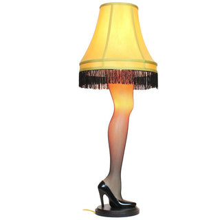 A Christmas Story 40-inch leg lamp with fishnet stocking and black fringe lampshade by Department 56