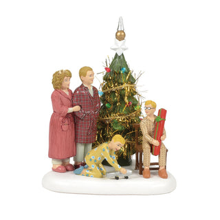 Department 56 A Christmas Story Ralphie family figurine set around decorated Christmas tree