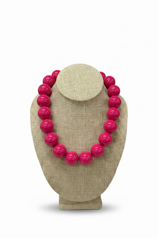 The Blessed Nest chunky hot pink oversized round bead statement necklace on display bust