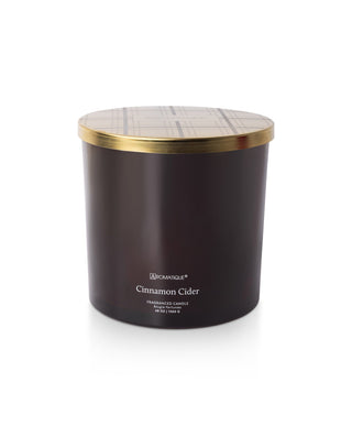 Aromatique Cinnamon Cider 48oz fragranced candle in dark brown vessel with gold patterned lid
