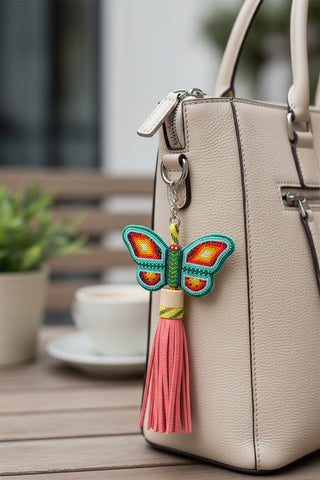 Butterfly keychain with pink tassel