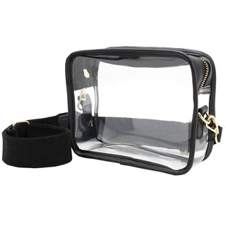 Capri Designs clear camera crossbody bag with black trim and gold zipper hardware