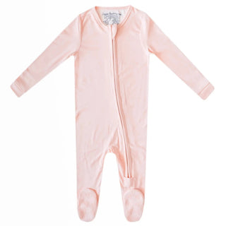 Solid light pink minimalist baby footie pajamas with star sole detail