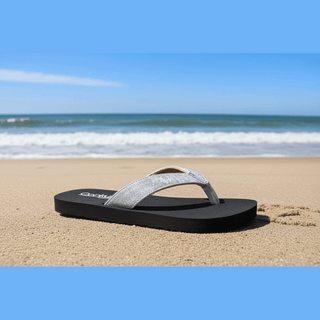 Black flip-flop with metallic strap