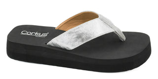 Silver flip flop with black cork bottom