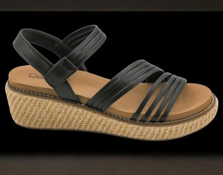 Black wedge sandal with a woven sole 