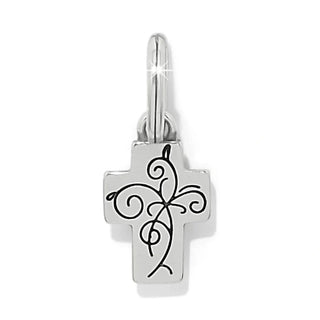 Silver-plated cross charm back view with engraved black floral vine motif