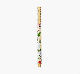Rifle Paper Co. Curio rollerball pen with white floral botanical pattern and gold accents