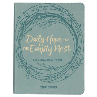Dusty teal faux leather devotional book Daily Hope for the Empty Nest with gold foil title and embossed wreath design