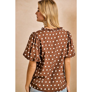 Mocha brown polka dot blouse with puff sleeves and ruffled neckline, back view
