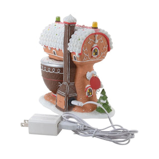 Department 56 Piper's Piping Academy lighted Christmas village figurine side view with gingerbread tower and mixing bowl base