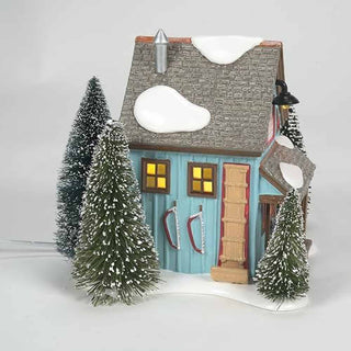 Department 56 Snow Village lit miniature tree lot building with snow-covered pine trees
