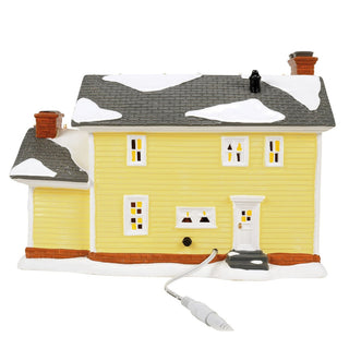 Department 56 Griswold Holiday House ceramic village figurine with snow-covered roof and interior lighting