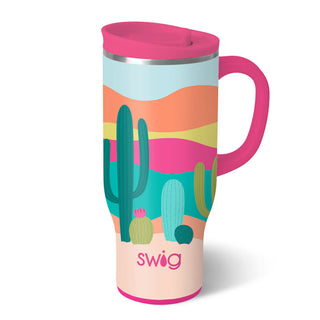 Swig 24oz Desert Glow travel mug with pink handle, cactus desert print, and pink lid