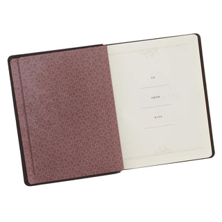 Open devotional journal showing decorative endpaper and gift inscription page with To, From, Date fields