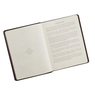Open Radical Wisdom devotional book with faux leather cover showing introduction page