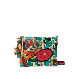 Consuela Dezi Downtown Crossbody with cactus patchwork, pink rose embroidery, and multicolored woven strap