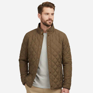 Man wearing Local Boy Outfitters diamond quilted jacket in mocha brown over gray t-shirt