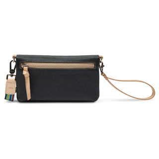 Side view of black glitter woven crossbody with horizontal zipper tan leather pull tabs and rainbow strap