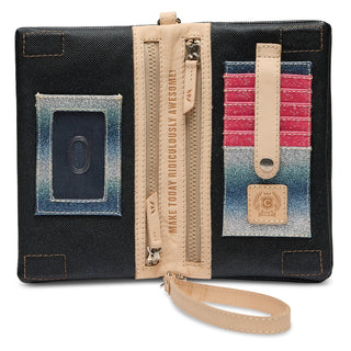 Open interior of black glitter crossbody showing card slots zippers and 'Ridiculously Awesome' embossed lining