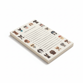 Things to Fetch dog notepad shown at angle with illustrated dog breeds